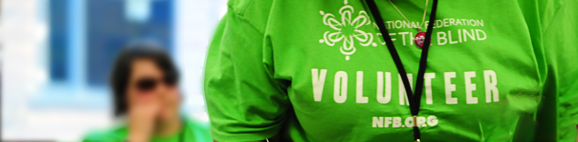 Close up of a t-shirt reading Volunteer.